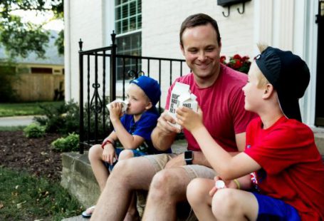 Family - A father and his two boys enjoy drinking Boxed Water