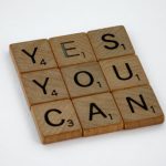 Self Confidence - brown wooden blocks on white surface