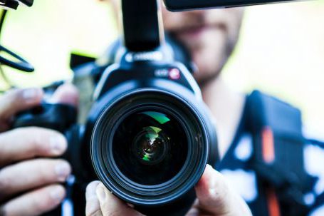 Productive Action - Person Holding Canon Dslr Camera Close-up Photo